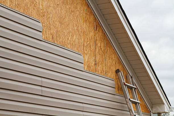 Professional Emergency Siding Repair technician working in Rockbridge, OH